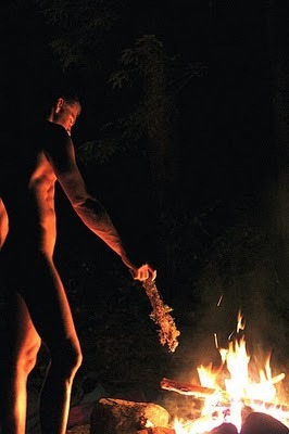 man with giant facial tumor naked at campfire pics